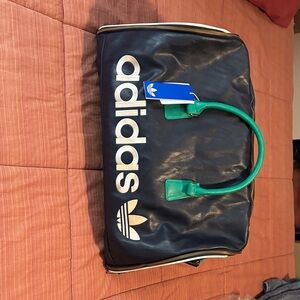 Adidas Men's Duffel Bag in Navy and Green leather brand new